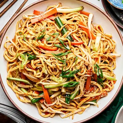 Fried Noodles with Vegetables and Meat Sauce